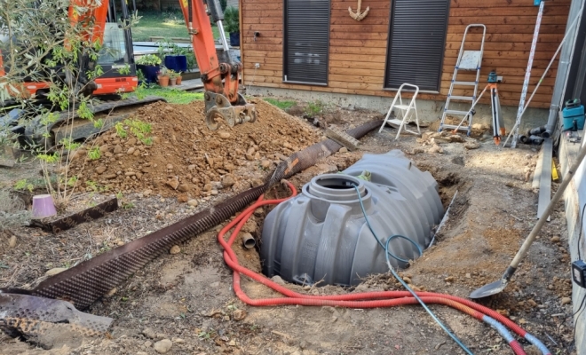 Création de terrasse bois avec cuve de récupération d'eau à Francheville