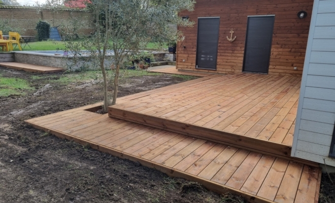 Création de terrasse bois avec cuve de récupération d'eau à Francheville