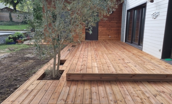 Création de terrasse bois avec cuve de récupération d'eau à Francheville